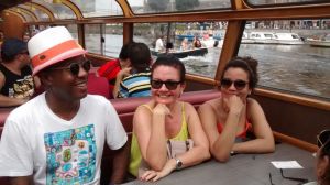 Family boat trip on canals of Amsterdam